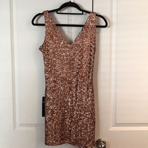 Bebe Addiction copper sequin lace up dress